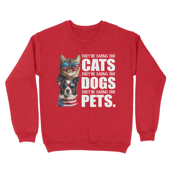 They're eating the cats, they're eating the dogs Sweatshirt.