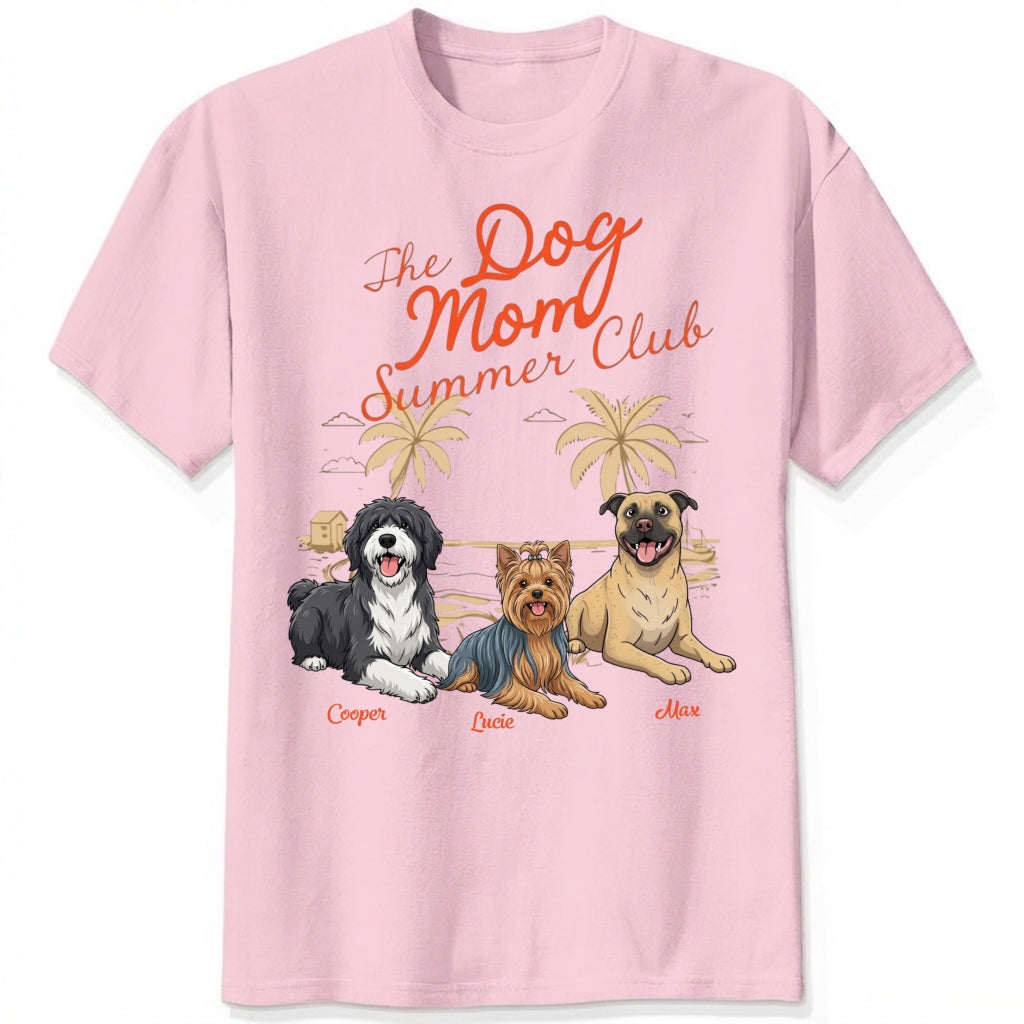 A pink short-sleeve crewneck t-shirt featuring a colorful graphic print of custom dogs with the text 'The Dog Mom Summer Club' and dog's names underneath. There are many dog breeds to choose from.
