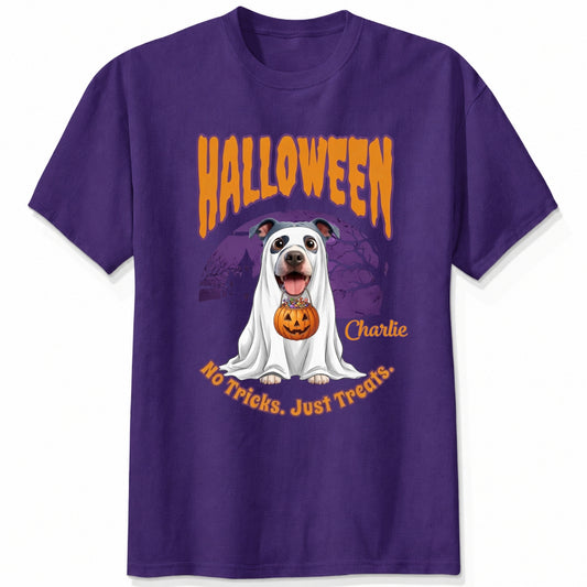 A custom 1-4 dogs purple t-shirt featuring a Halloween graphic of dogs dressed as a ghost holding a pumpkin, with the text 'HALLOWEEN', 'No Tricks. Just Treats.